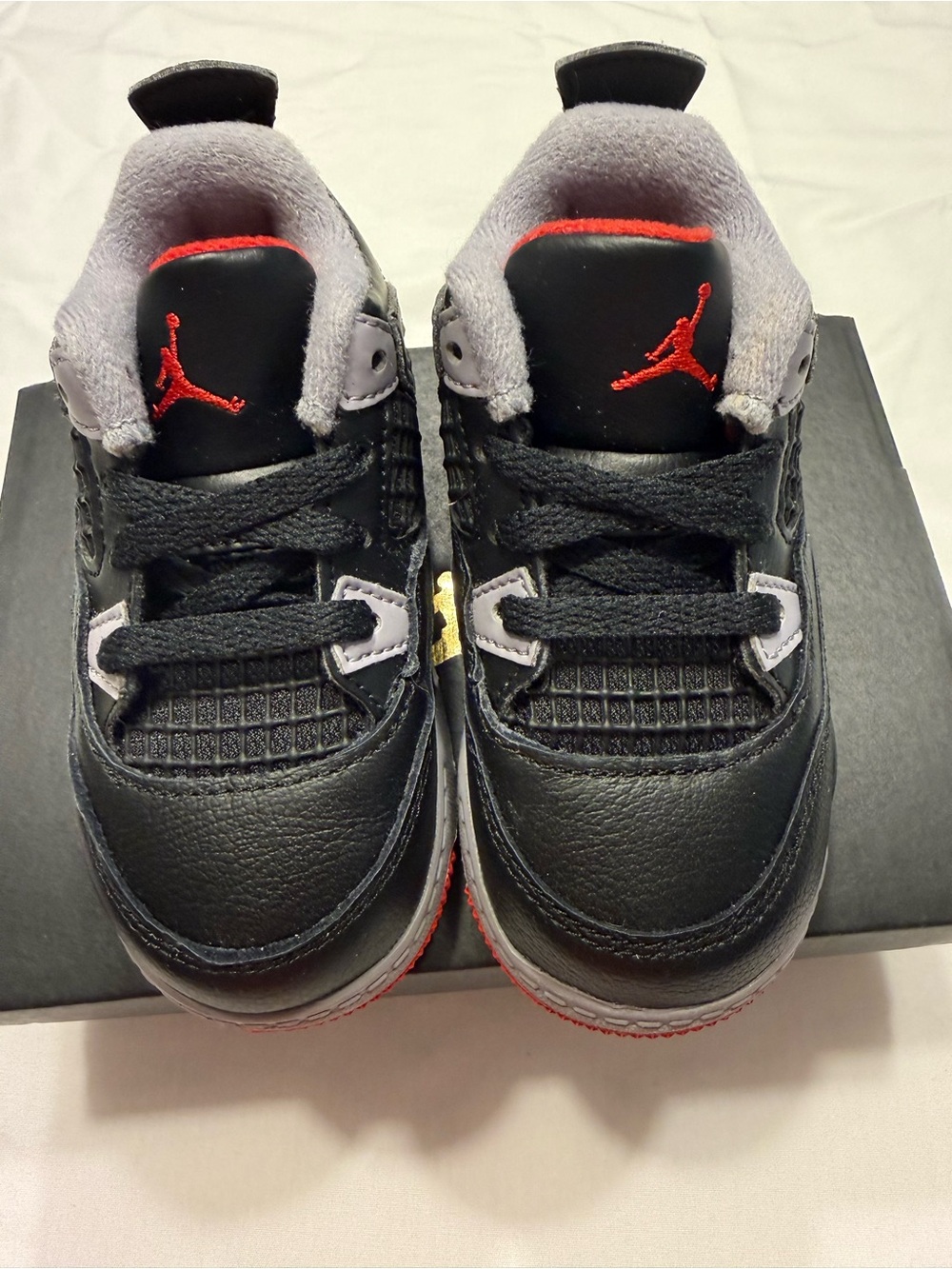 Jordan Kids Black and Red Retro Style Sneakers